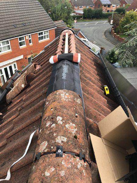 Unrolling over the apex with the kit boxes beside us