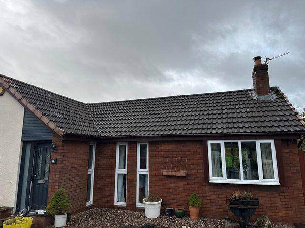 The finished roof &mdash; one even tile colour across the whole bungalow